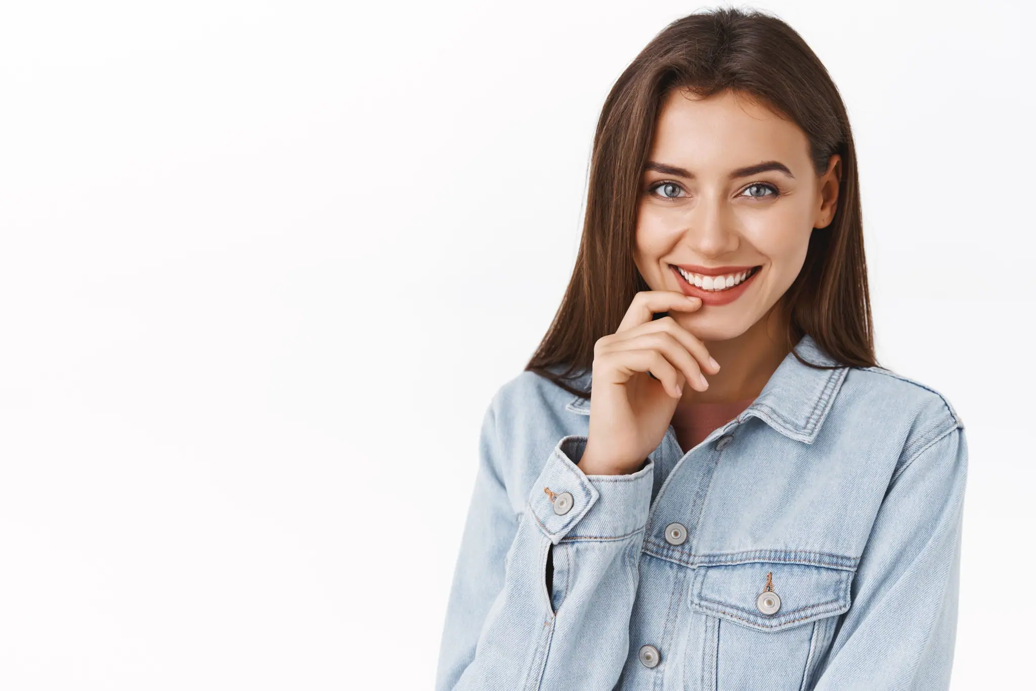 Smiling woman in a denim jacket
